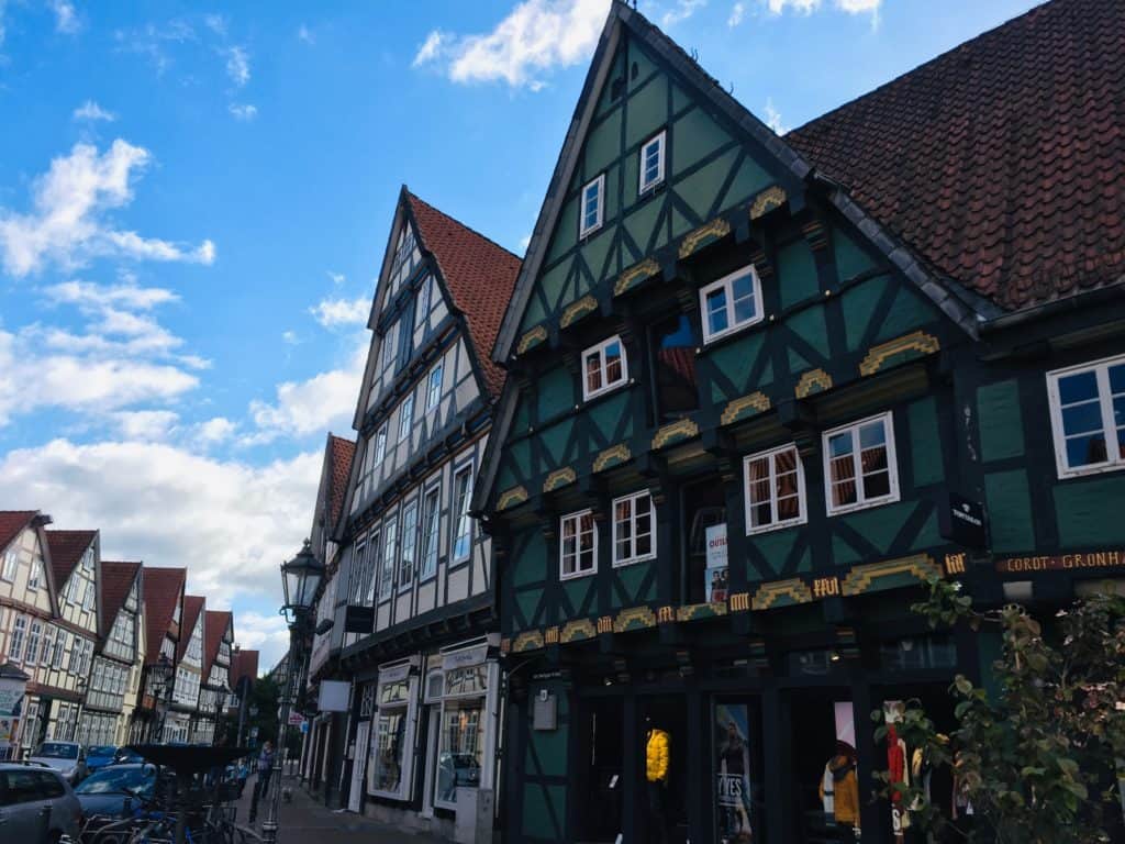 Some of the old medieval buildings in Celle - a place that is easily reachable even if you only have 2 days in Hannover.  You can see two with green and white colours.