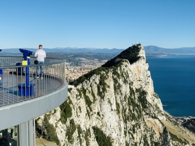 Picture of the viewing station at the top of the Rock of Gibraltar - you can see the rock and look out across to the sea
