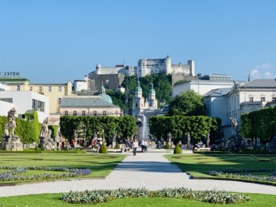 View of the castle in Salzburg from the Mirabell Palace and Gardens.  We visited at the of our Sound of Music tour
