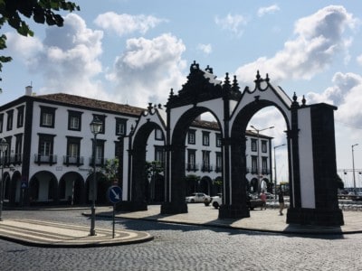 The Portas de Cidade - an old city gate in the centre of Ponta Delgada: visit this on day 1 of your Sao Miguel itinerary
