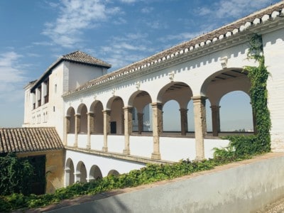 A residence in the Generalife gardens. This is whitewashed with terraces looking out to the outside.