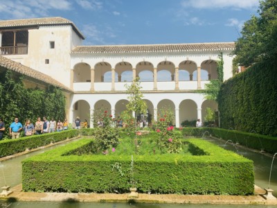 A picture of part of the Generalife gardens with a residence and neat outside gardens.  You can walk here from the Alhambra on your visit to the Alhambra
