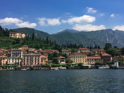A view of Bellagio from the lake, one of the towns on Lake Como.  You can see the colourful houses and the vegetation on the hill behind.