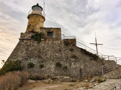 A view of the top of the fort with its lighthouse and mast.