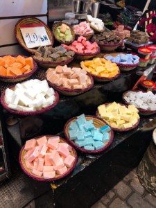 A picture of a stall in the souk selling soap.
