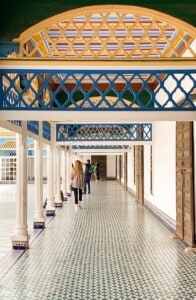 A walkway around the large courtyard - you can see the striped ceiling of the walkway.